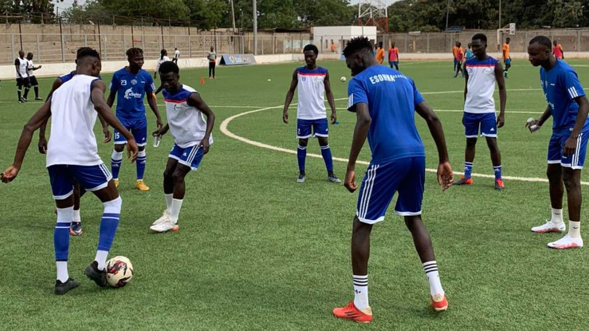 eSohna Academy players completing a ball drill on the football pitch